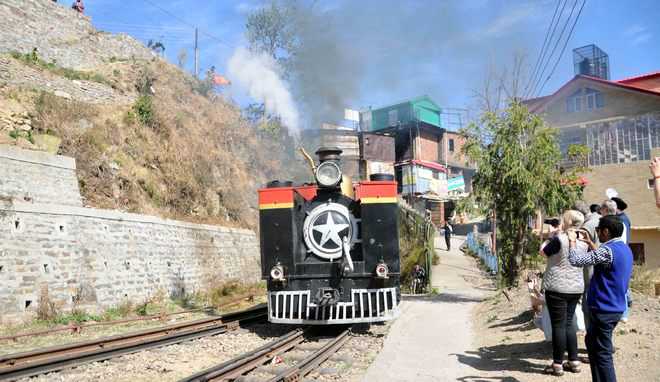 Steam engine chugs on Shimla-Kalka rail track