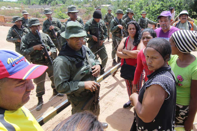 Family members say 7 Venezuelans killed in remote gold mine