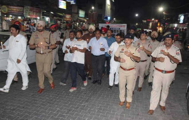 Candlelight march to pay tributes to police martyrs
