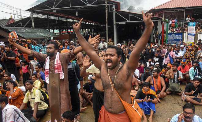 Protests erupt over rumours of TN woman climbing Sabarimala hill