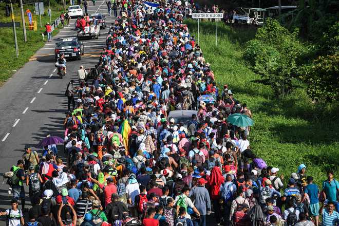 Honduran migrants march towards US as Trump vows ‘full efforts’ to halt them