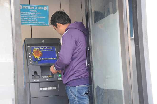SBI halves daily ATM withdrawal to Rs 20K for certain card holders