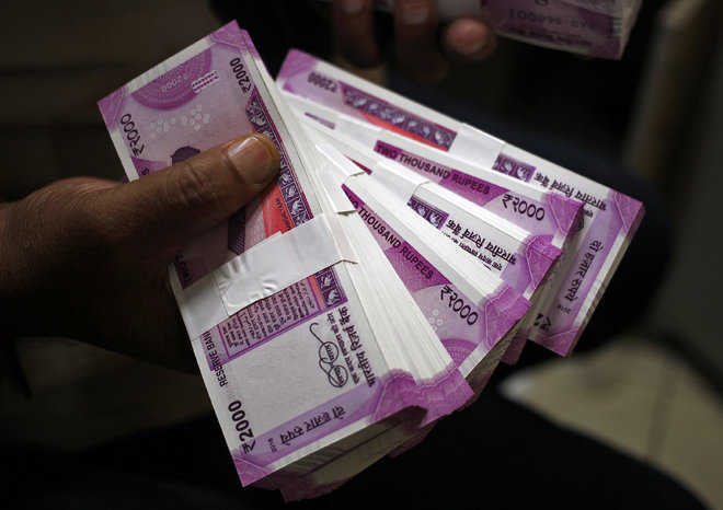 Rupee rises 67 paise against US dollar on falling crude prices