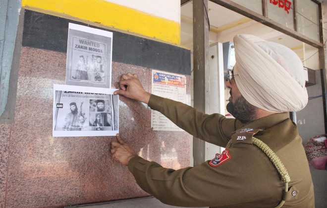 Posters of Zakir Musa come up at city railway station