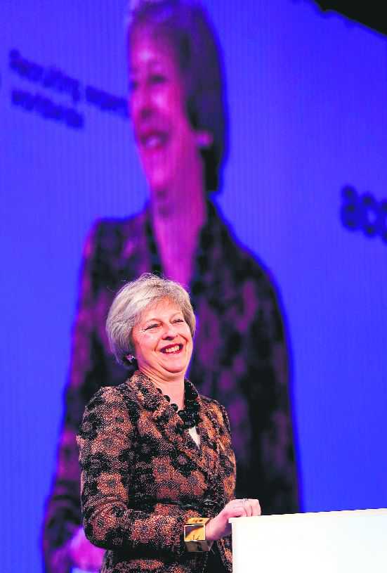 May wins business backing