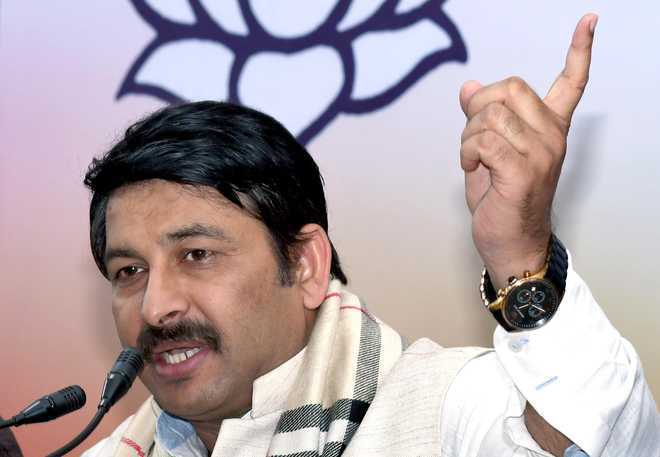 BJP''s Manoj Tiwari let off with warning in contempt case