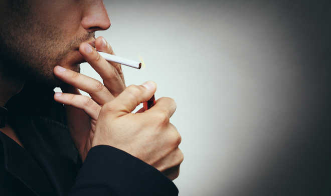 Negative social cues on tobacco packaging may help smokers quit