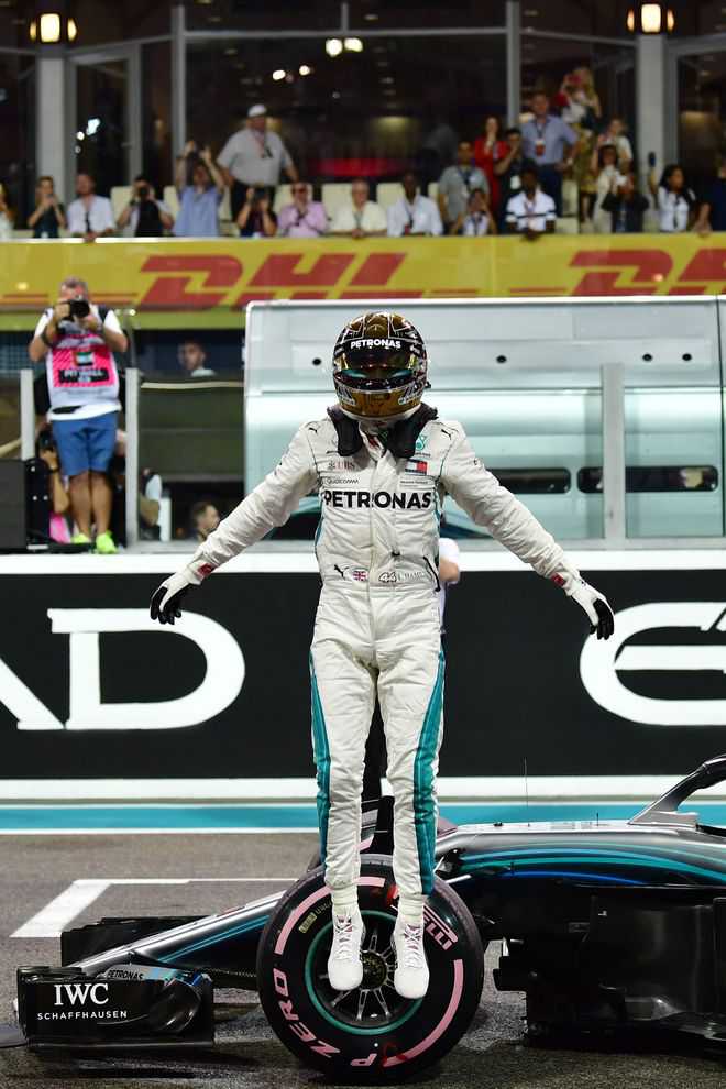 Hamilton on pole with record lap