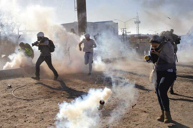 US fires tear gas to repel migrants