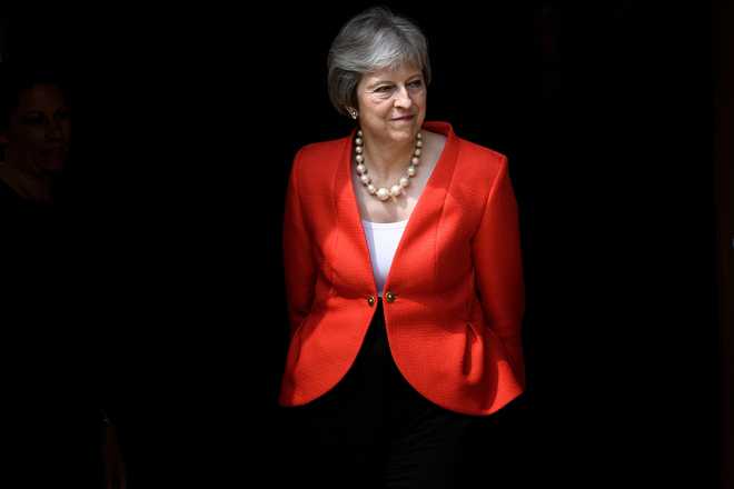 UK PM Theresa May faces fight for her political life in Brexit deal