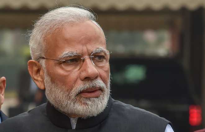 Accept people''s mandate with humility, says PM Modi