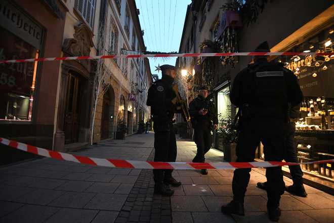 3 killed in France Christmas market shooting, gunman at large