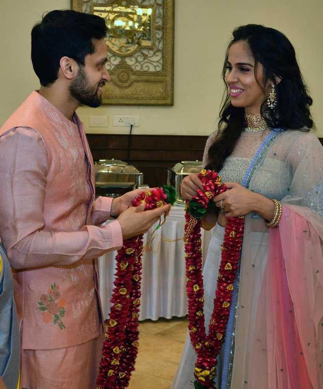 Saina Nehwal and Parupalli Kashyap's Wedding Reception! | South indian  bride, Reception lehenga, Wedding reception