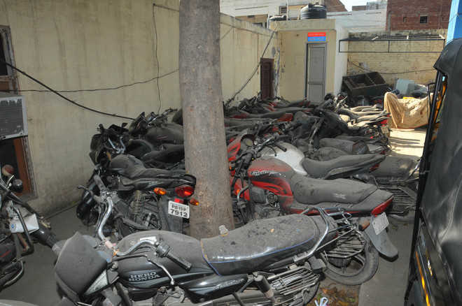 Confiscated vehicles pile up at district police stations