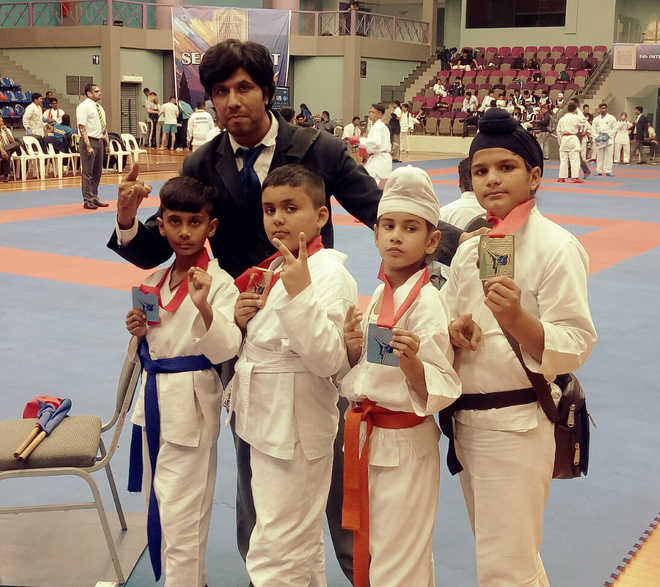 Bhavnik, Parmeet shine in karate championship
