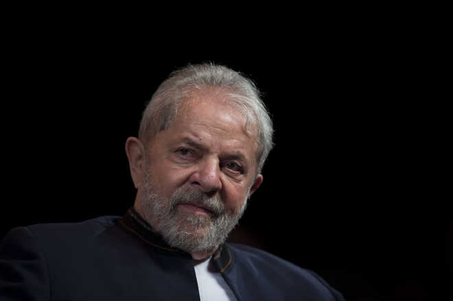 Brazil’s Lula stays in prison as top judges tussle over release