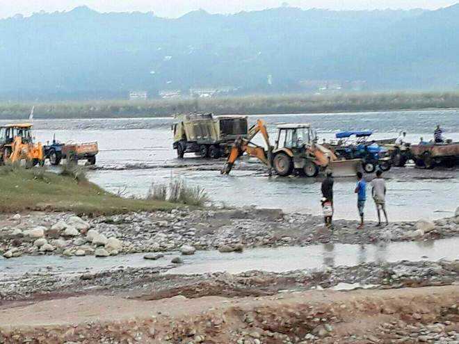 Stone crushers on river banks violate green tribunal orders