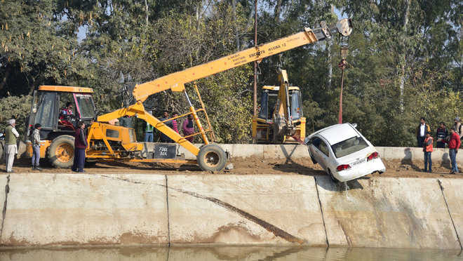 Miraculous escape for two as car slips into Sidhwan canal