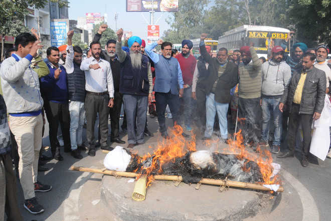Ministerial staff adamant on demands, burn govt effigy