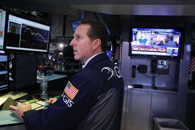 Global market panic fades as Wall Street stems bleeding