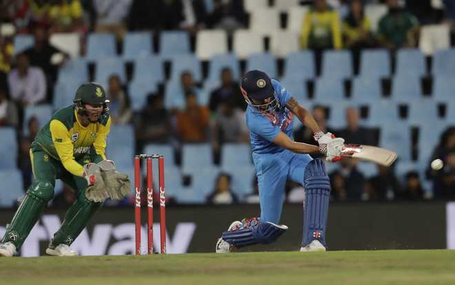 Pandey, Dhoni fifties guide India to 188/4