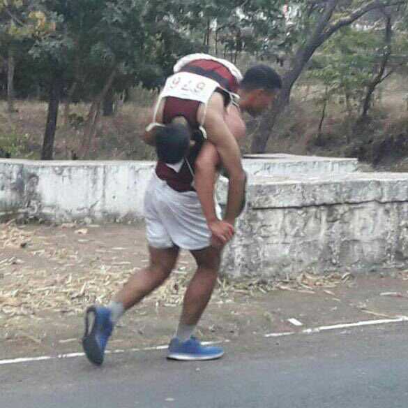 NDA cadet carries mate on back during race, wins praise