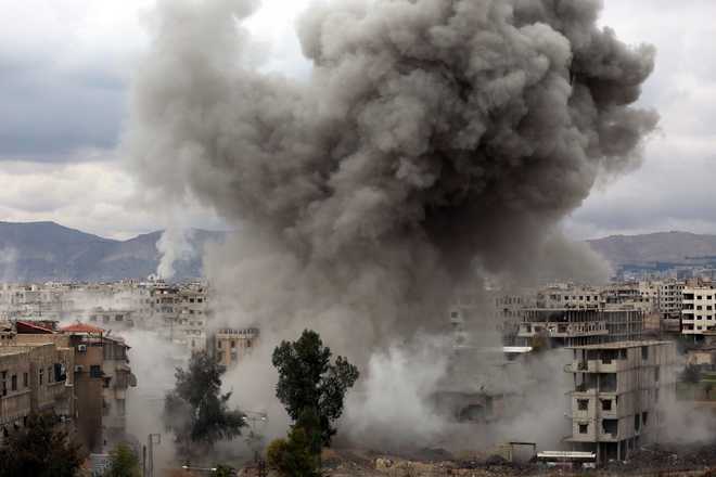 Five-day assault on Syria enclave kills more than 400