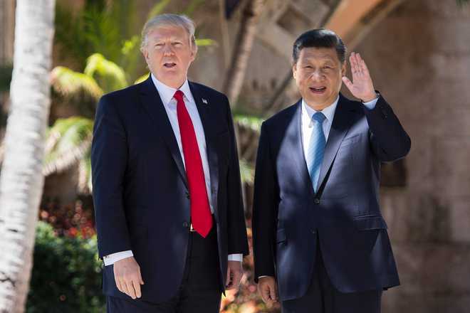 China absolutely killing US on trade says Trump