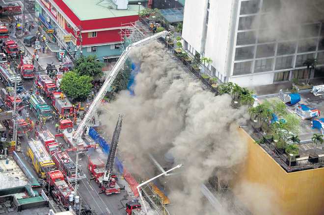 3 dead in Manila hotel fire : The Tribune India