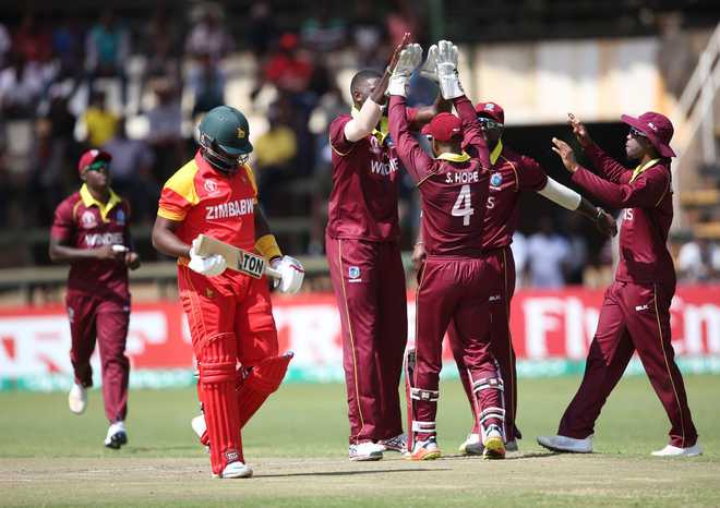 West Indies edge Zimbabwe to stay on World Cup course