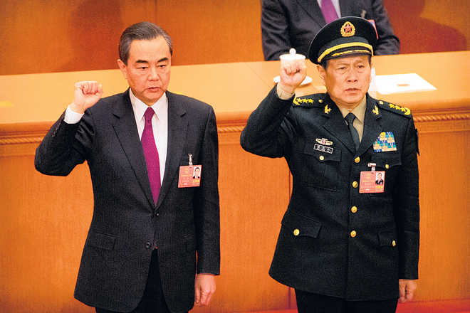 China elevates Wang Yi to State Councillor
