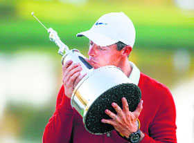 McIlroy ends title drought, Woods  T-5th
