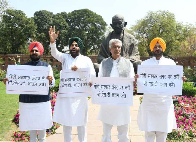 Punjab Congress MPs protest, want GST on langar to go
