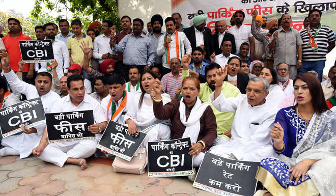 Cong protests parking fee hike, seeks rollback