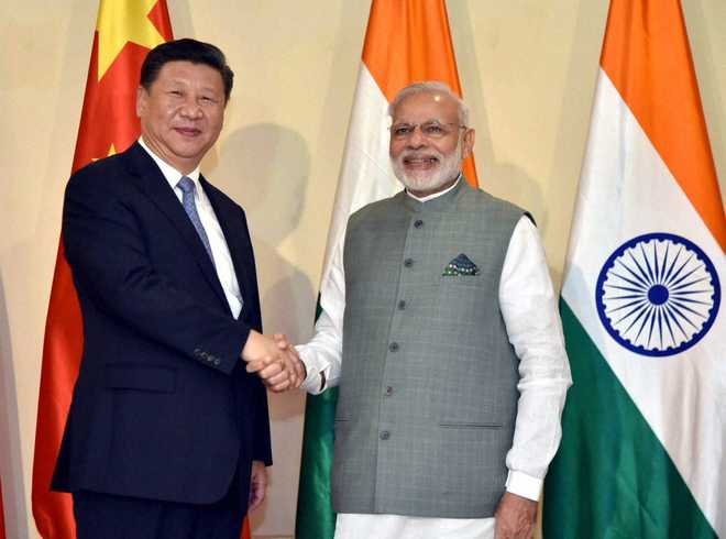 Modi-Xi meet: World to hear ‘positive voices’ against protectionism, says China