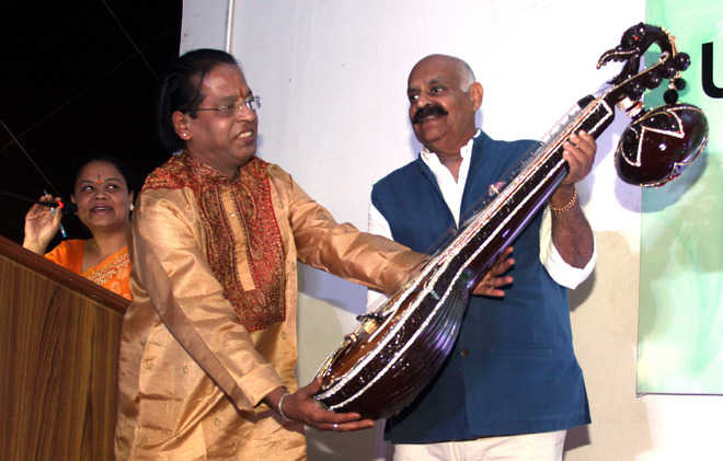 Guv launches musical instrument at art gallery