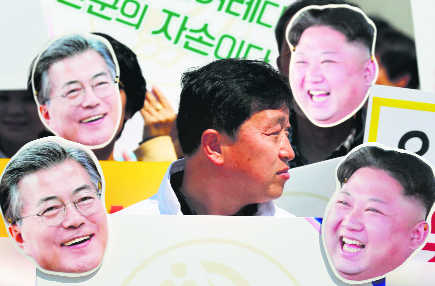 Unification less of a priority as Korean leaders prepare to talk