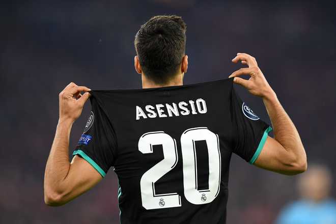 Real in pole position after Asensio scores winner at Bayern