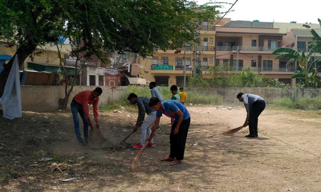 Students clean village park