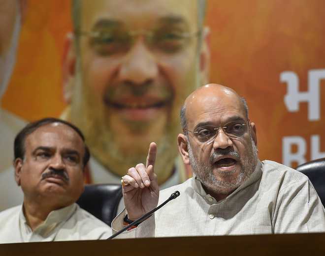 Shah defends BJPs efforts to form govt in Karnataka