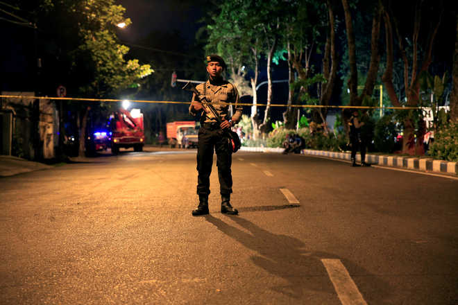 Indonesia passes tougher terror law after suicide attacks