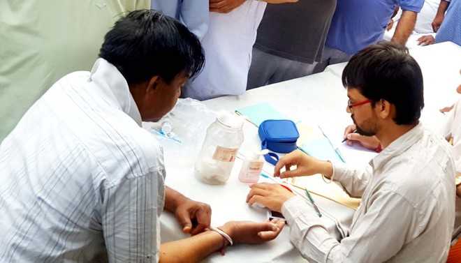 Labs seek patients’ Aadhaar details before giving reports