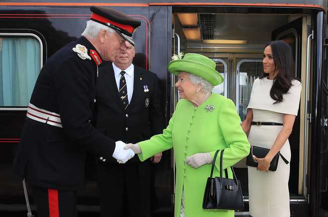 Britain''s Queen Elizabeth, Meghan begin first joint royal trip