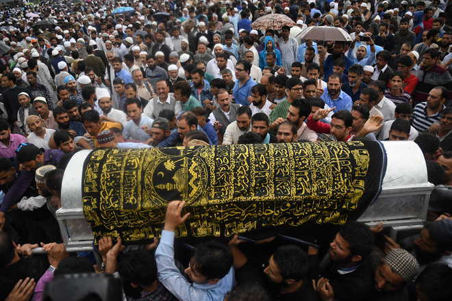 Shujaat Bukhari laid to rest in ancestral village in Kashmir