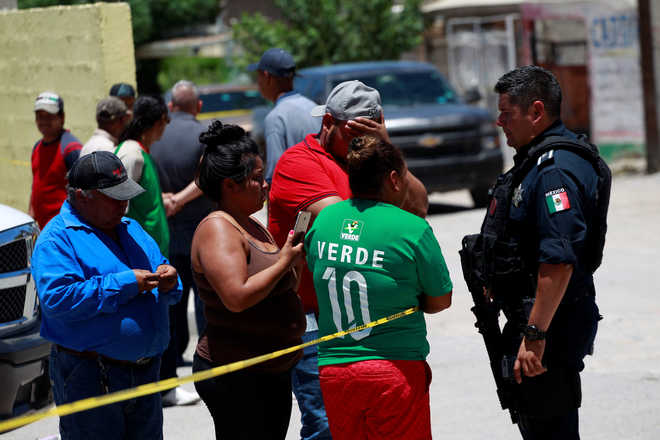14 killed in shooting attacks in Mexican border city