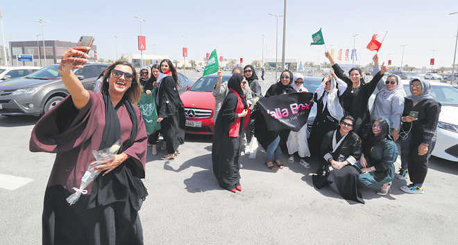 Saudi women take victory lap as driving ban ends