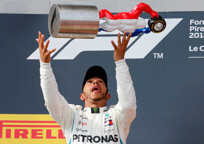 Hamilton sizzles in France, restores championship lead