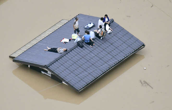 At least 38 killed, 50 missing as torrential rain pounds Japan