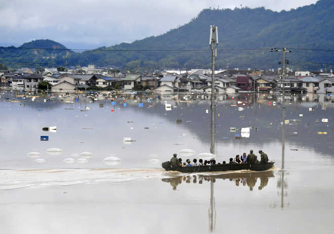 At least 64 killed in Japan after ‘unprecedented’ rain, dozens missing