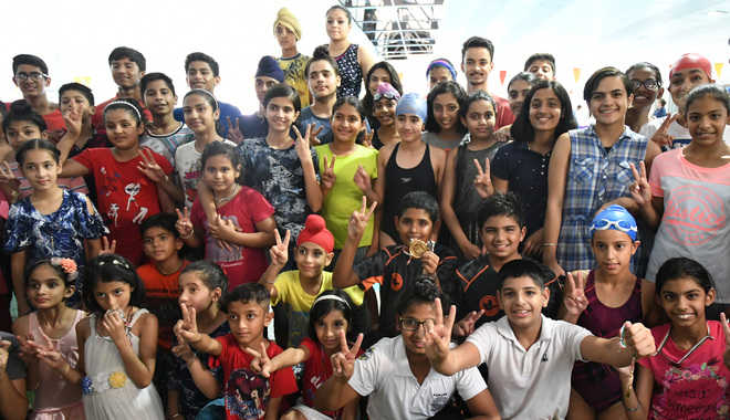 Tejinder bags twin swimming gold